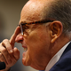 U.S. President Donald Trump’s personal attorney Rudy Giuliani speaks during an appearance before the Michigan House Oversight Committee on December 2, 2020 in Lansing, Michigan.